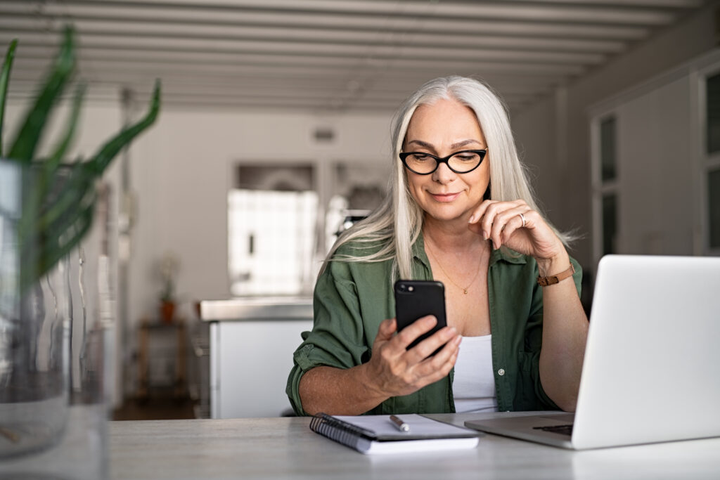 Woman schedules water heater leak services online