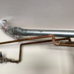 Johns Creek Plumbing Success Story: After picture of repaired copper pipe, resolving the water leakage issue.